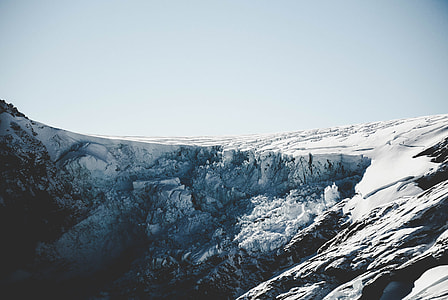 aerial photography of snow mountain during daytime thumbnail
