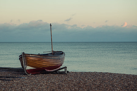 A boat sits on the shore on a tranquil sunset in Southern England, image captured with a Canon 5D thumbnail