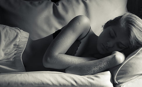 grayscale photography of woman in black bra thumbnail