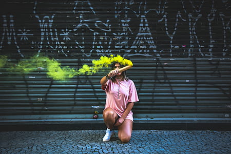 woman holding yellow smoke bomb thumbnail