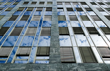 low-angle photo of glass window thumbnail