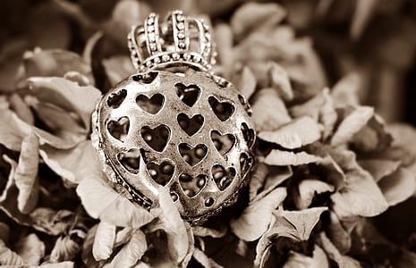grayscale photography of heart with crown pendant thumbnail