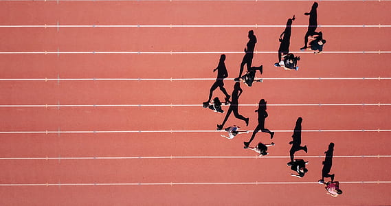 people running on track field thumbnail