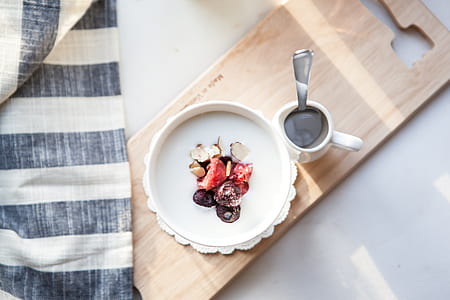 round white plate beside white mug thumbnail