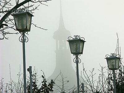 selective focus photo of three lamp posts thumbnail
