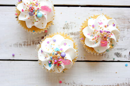 three white icing covered cupcakes thumbnail