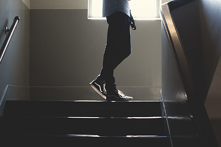 person standing on stairway thumbnail