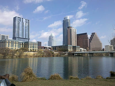 bridge near high rise buildings thumbnail