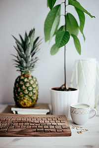Wooden keyboard and cup of coffee thumbnail
