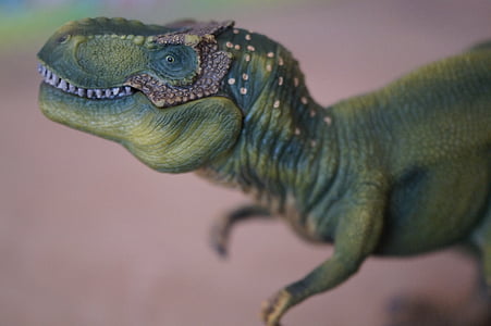 green dinosaur toy thumbnail