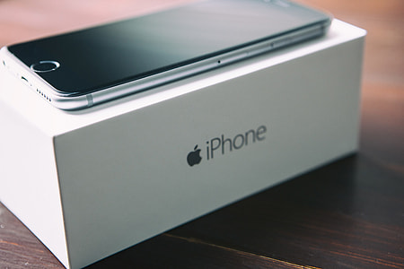 Close-up shot of the iPhone 6 mobile smartphone and original box thumbnail