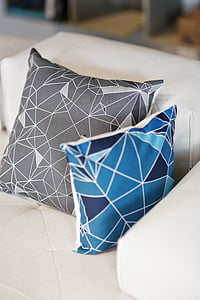 two gray and blue throw pillows thumbnail