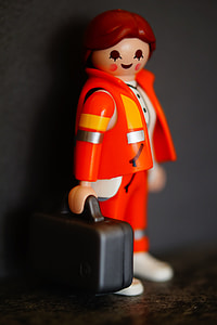 brown, beige, and orange Lego mini figure thumbnail