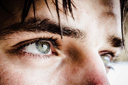 closed up photo of man's eye thumbnail