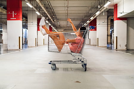 woman sitting inside shopping kart thumbnail