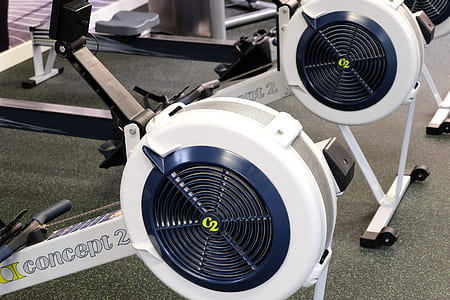 closeup of two Concept2 bikes on gray surface thumbnail