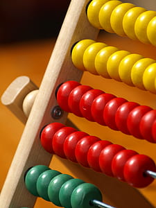 closeup photo of yellow, red, and green abacus thumbnail
