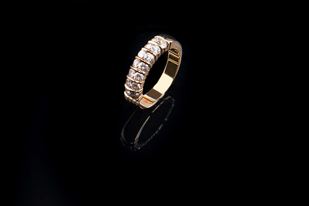 silver-colored and clear gemstone encrusted ring thumbnail