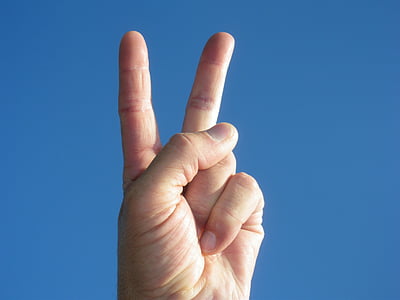 person doing peace hand signage thumbnail