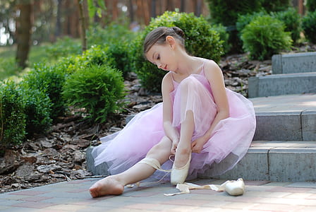 beliran girl sitting on gray concrete stair thumbnail