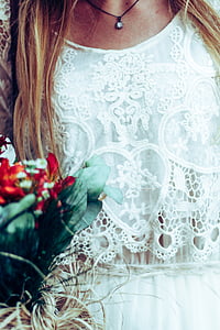 woman in white floral dress thumbnail