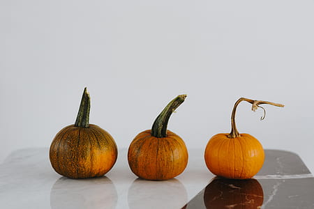 Orange halloween pumpkins on marble thumbnail