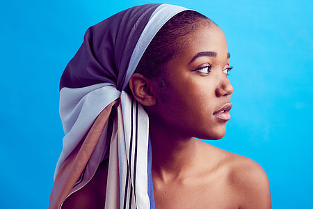 woman wearing blue and white headscarf thumbnail