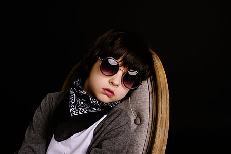 boy sitting on chair thumbnail