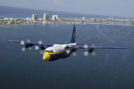 aircraft flying above ocean thumbnail