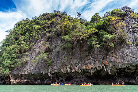 four boats with near island thumbnail