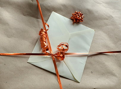 white envelope on gray textile thumbnail