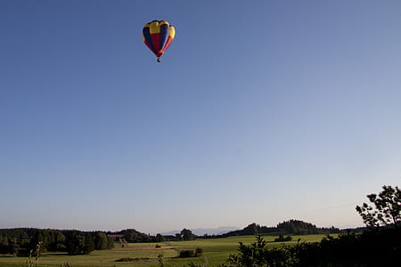 multicolored hot air balloon floating on air thumbnail