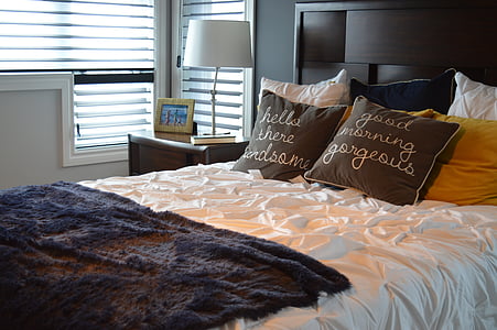 queen-size white and black bed thumbnail