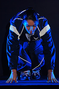close-up photograph of woman wearing blue zip-up jacket thumbnail