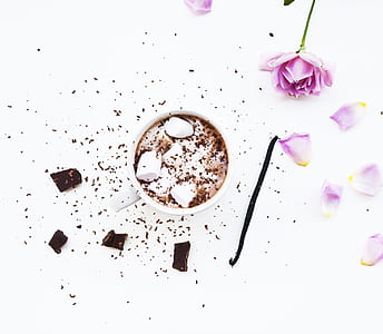 photo of purple flowers on top of white surface thumbnail