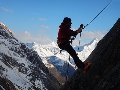 person climbing on mountain thumbnail