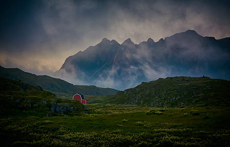 red barn house near mountain thumbnail