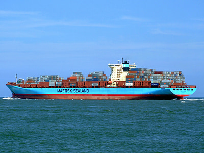 blue and brown cargo ship in ocean during daytime thumbnail