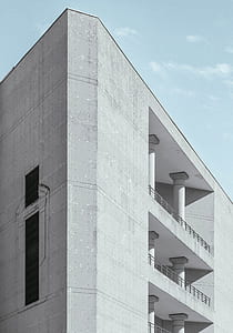 low angle photography of grey concrete building thumbnail