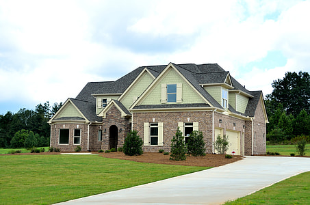 landscape photography of green, gray, and brown bungalow house thumbnail