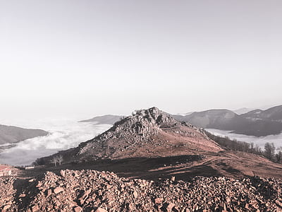 scenery of a mountain above clouds thumbnail