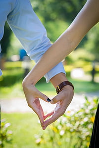 woman and man holding each other hands thumbnail
