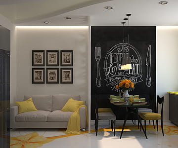 white sofa under several framed wall decors thumbnail