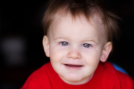 toddler smiling during daytime thumbnail