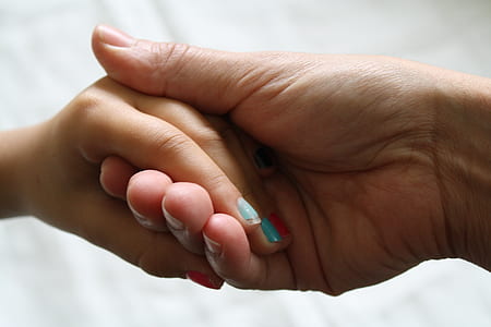 man and woman holding hands thumbnail
