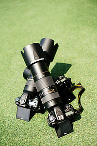two black DSLR cameras thumbnail