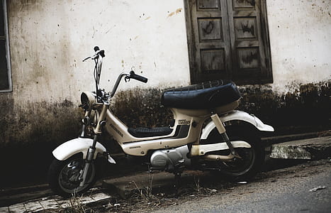 white motor scooter thumbnail