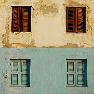 four closed wooden windows thumbnail