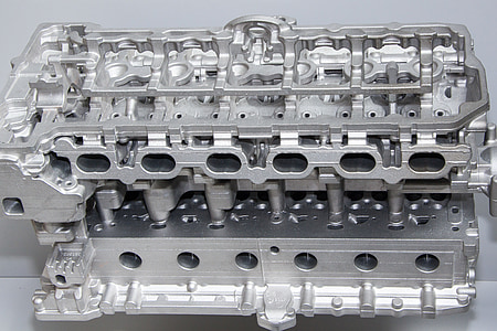 gray vehicle engine on white surface thumbnail