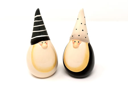 two beige gnome figurines thumbnail